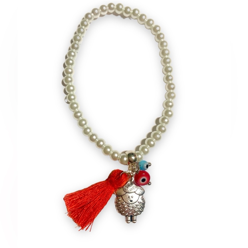 Pearl Beaded Bracelet with Red Tassel and lucky sheep Silver Charm